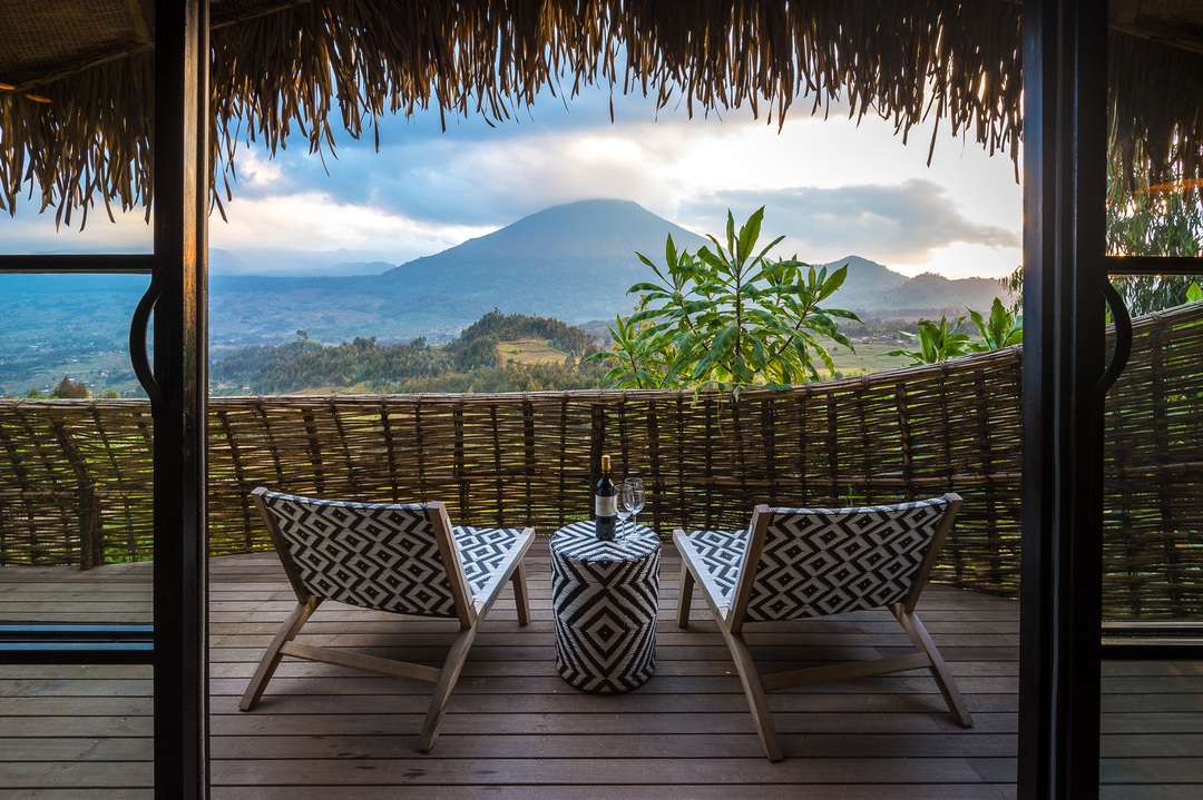 View from Bisate Lodge towards a cloud topped mountain