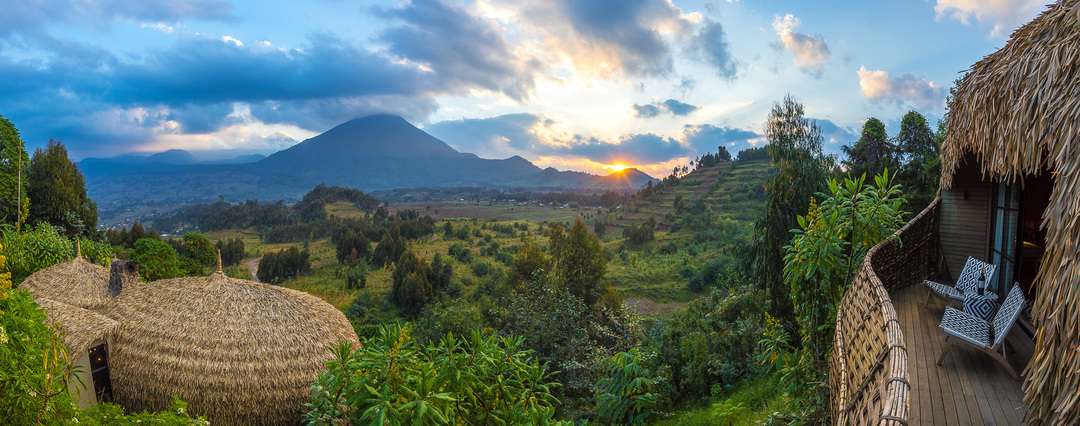 View from Bisate Lodge towards 3 volcanoes Sabinyo, Gahinga, and Muhabura