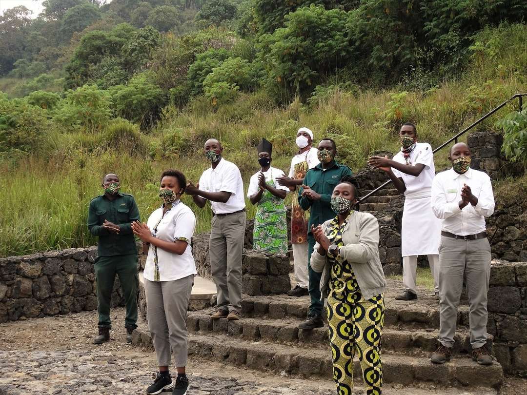 Staff members greeting guests on arrival