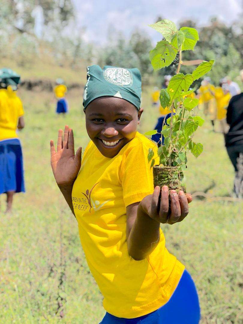 Children from the eco-club participating in the reforestation project